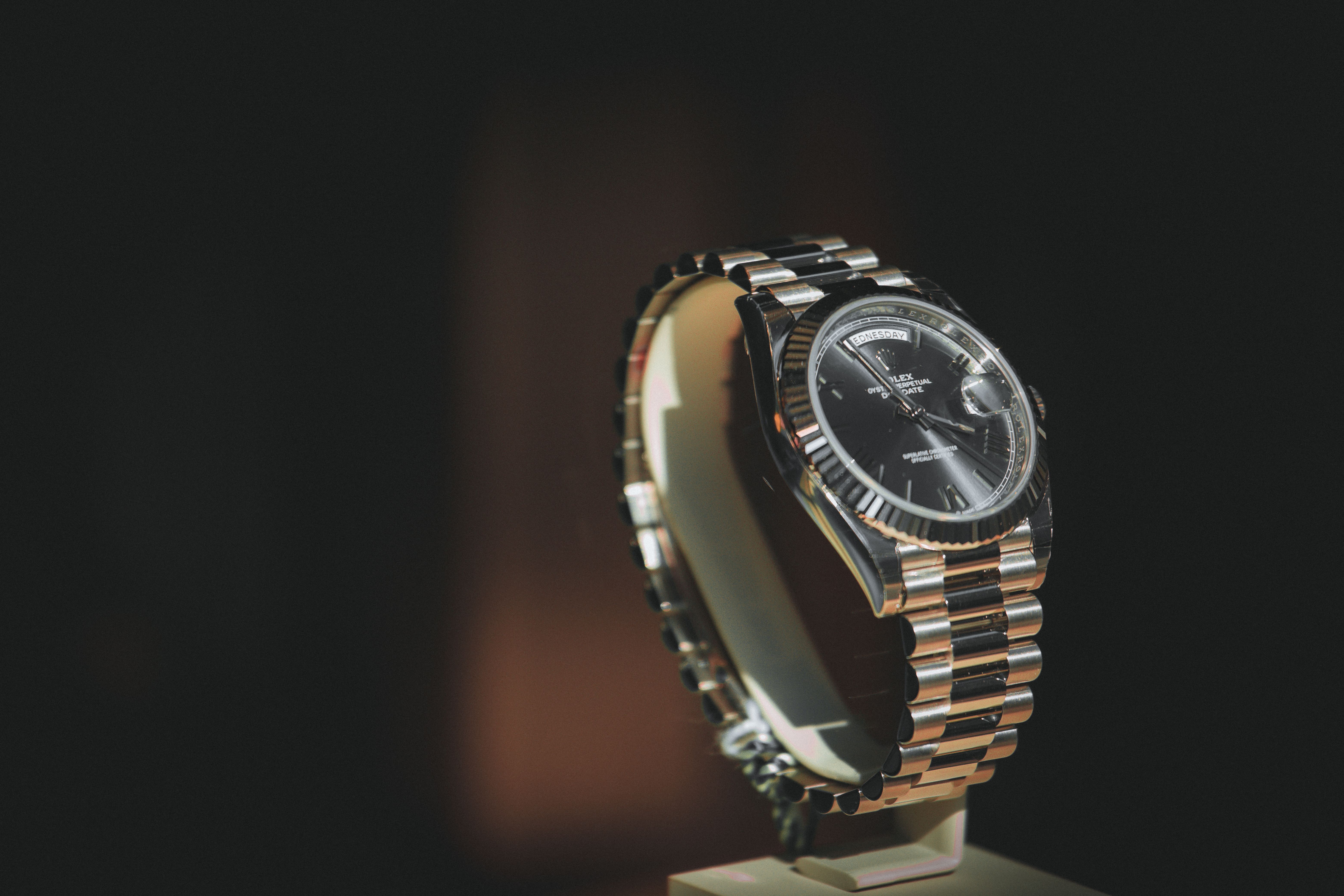Rolex Submariner photographed from above on a dark surface, dial and bezel in sharp focus